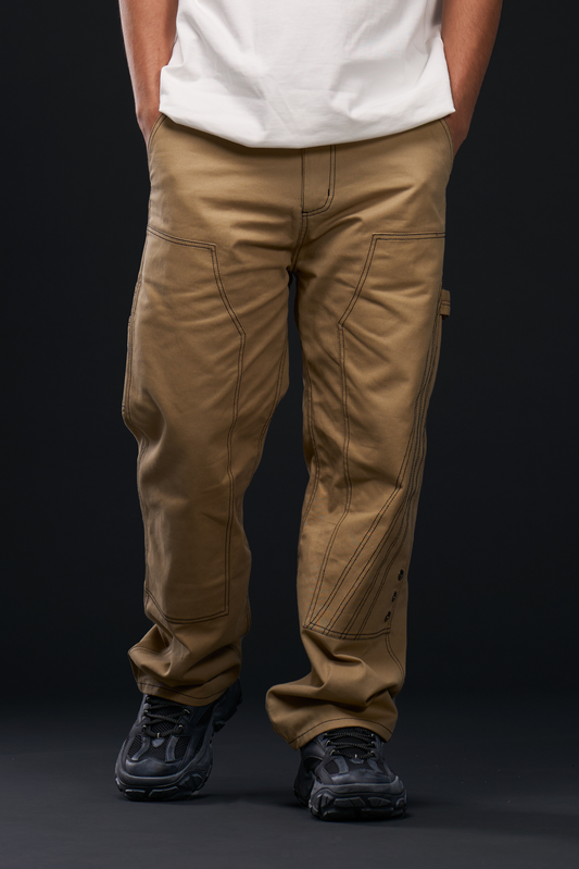 RIG. PANTS in khaki — front, worn on model