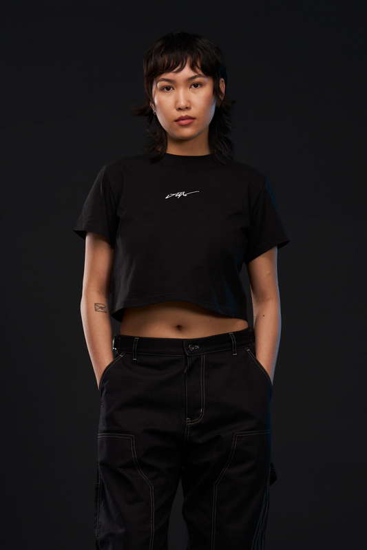 ETCH. LOGO WOMEN'S CROP TOP in black — front, worn on model