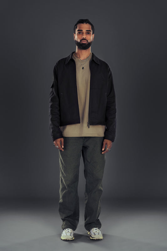 IKE. JACKET in black — worn open, front, full length