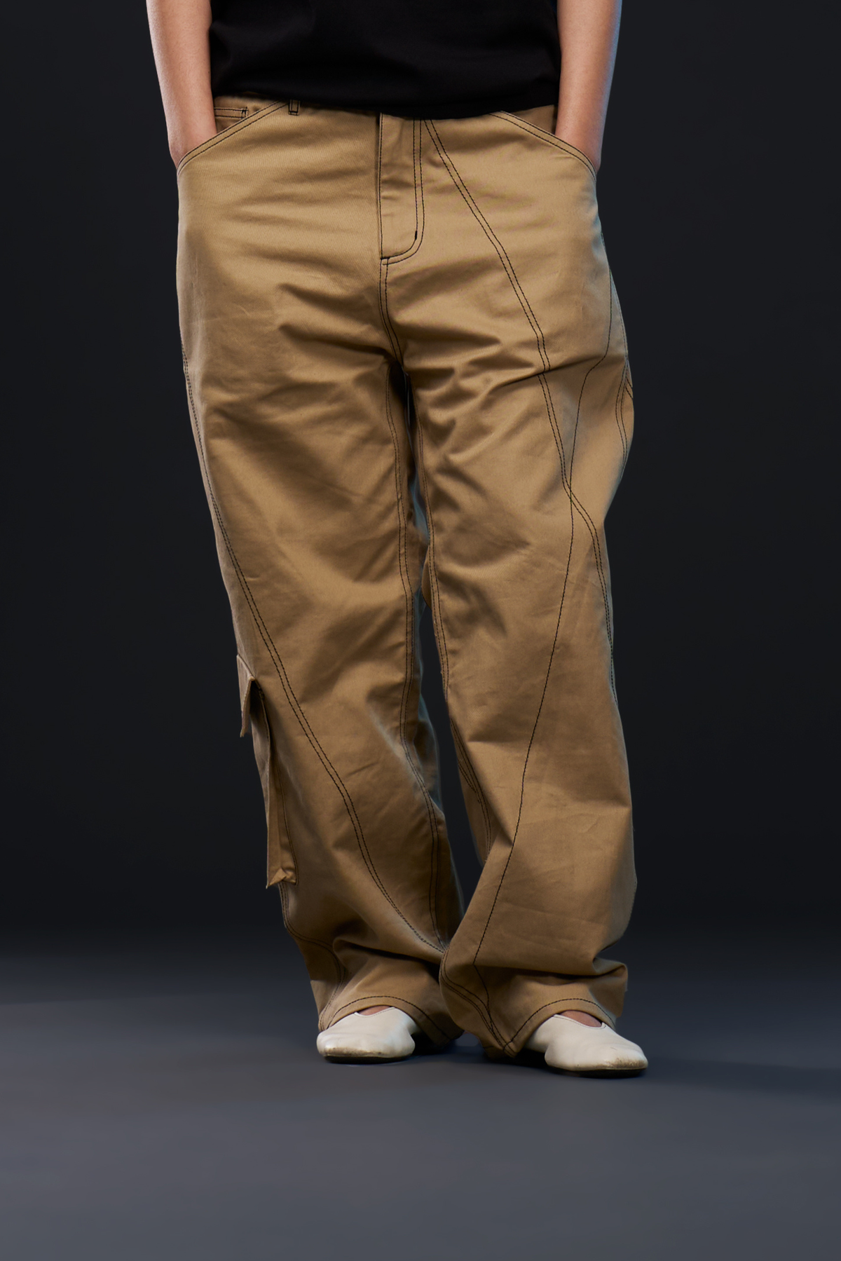 NODE. PANTS in khaki — front, worn on model