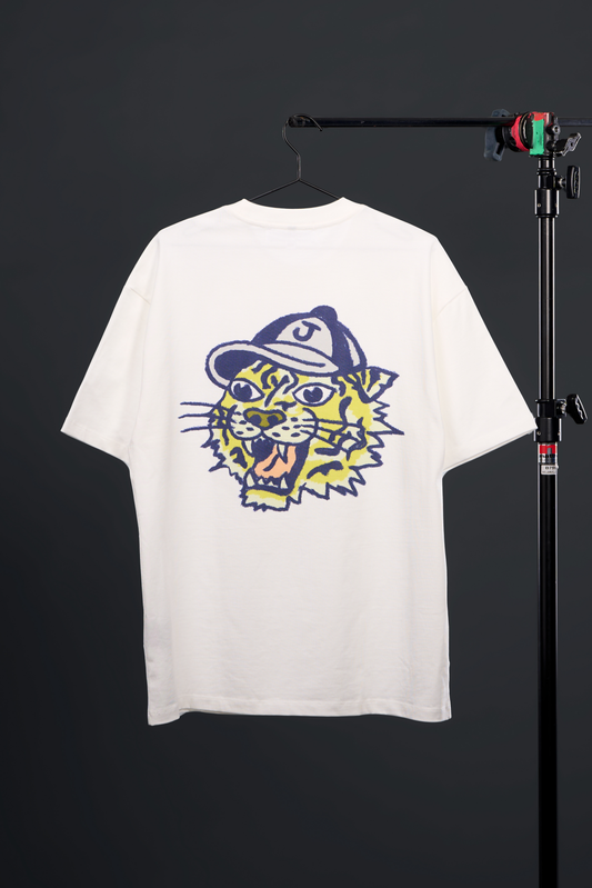 JŬN TIGER. TEE in white — back, flat lay, tiger graphic and tagline