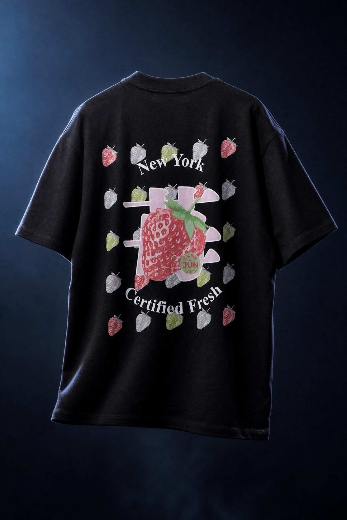 ICHIGO. TEE in black — back, floating product shot, strawberry graphic