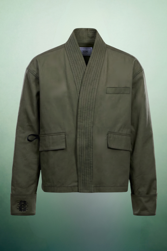 ETERNAL. JKT in green — front, ghost mannequin