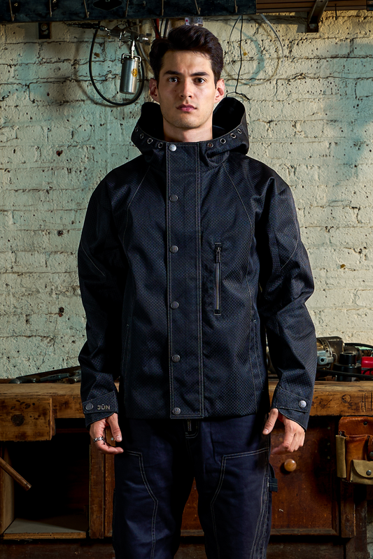 NOVA. JKT in navy — front, worn, garage setting