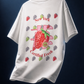ICHIGO. TEE in white — back, floating product shot, strawberry graphic