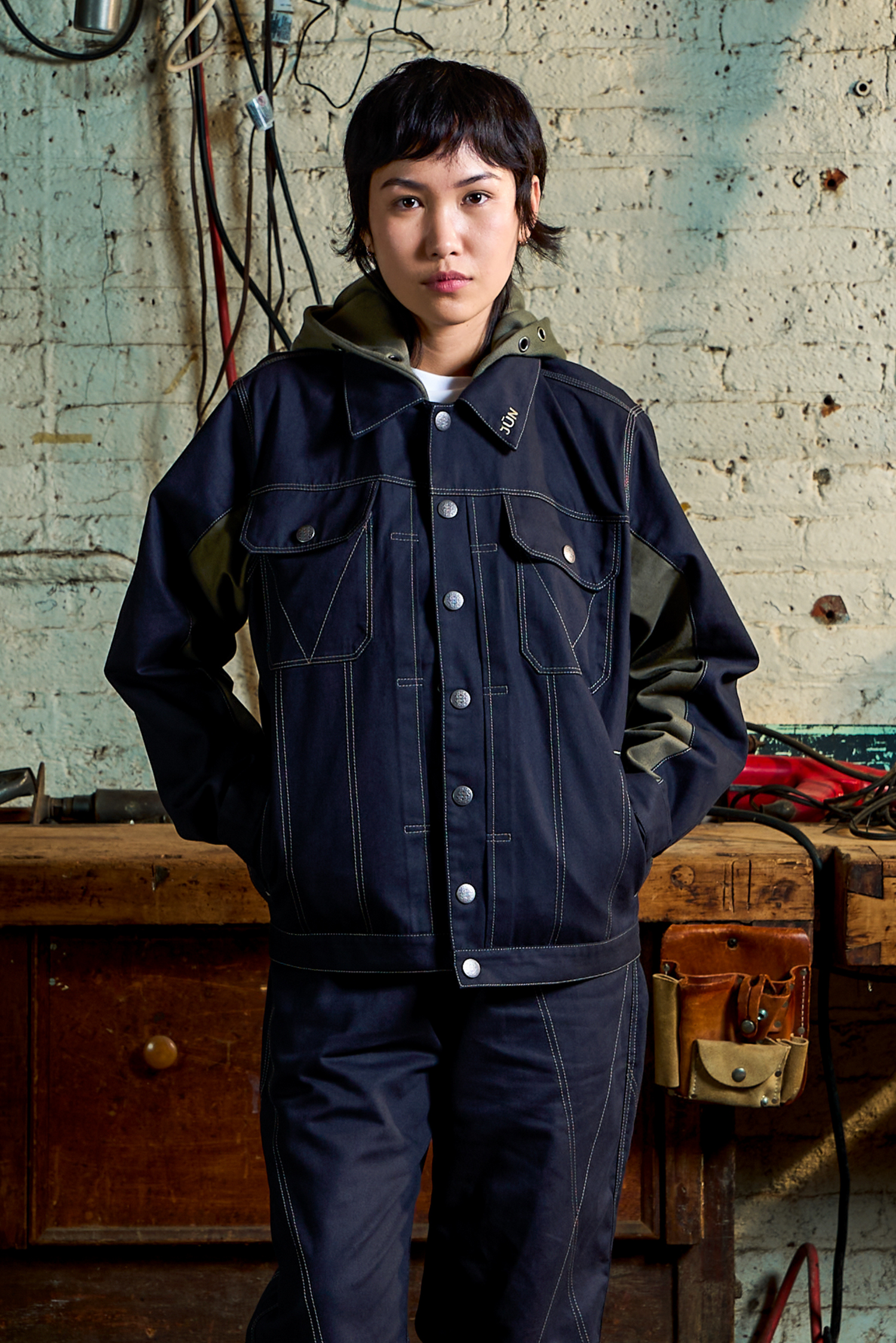 TERRA. JKT in black — front, worn on model, hands in pockets