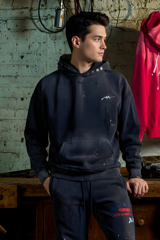 ETCH. LOGO DISTRESSED FLEECE HOODIE in black — front, worn on model